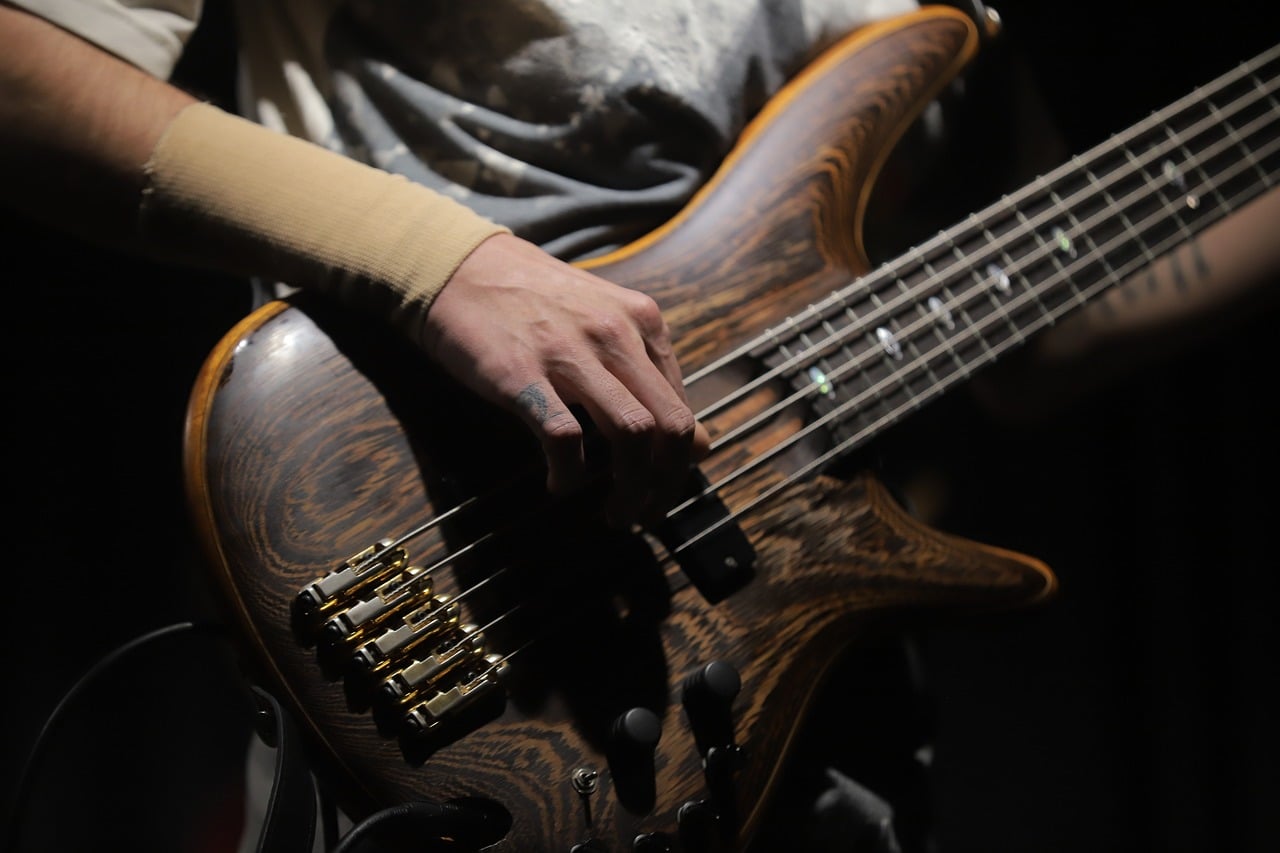 Bass guitar, musical performance, concert — What Sets Online Casino Direct Websites Apart